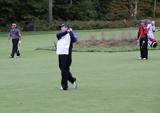 Mike D. eyeing his approach on the Par-5 18th.