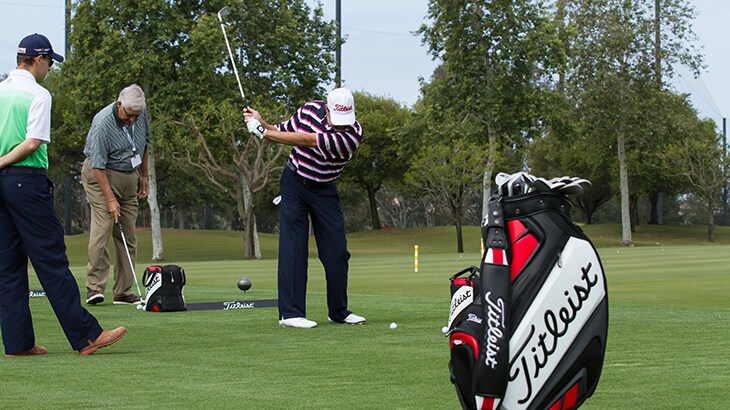 Team Titleist member Vern under the expert eye of...