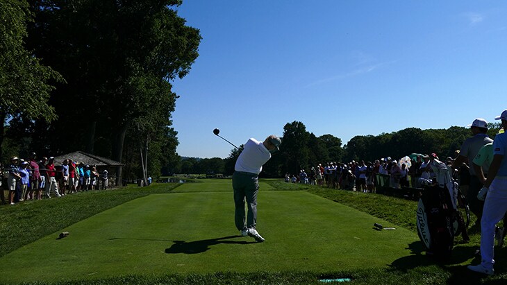 Hoffman splits the 18th fairway at Baltusrol Golf...